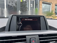 2011 bmw 1-serie 116i sport personenauto - afbeelding 12 van  23