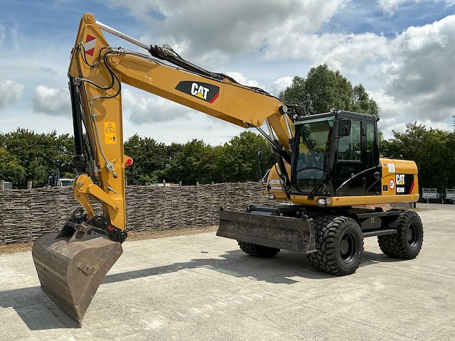 2011 caterpillar m316d banden graafmachine - afbeelding 1 van  65