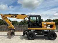 2011 caterpillar m316d banden graafmachine - afbeelding 25 van  65