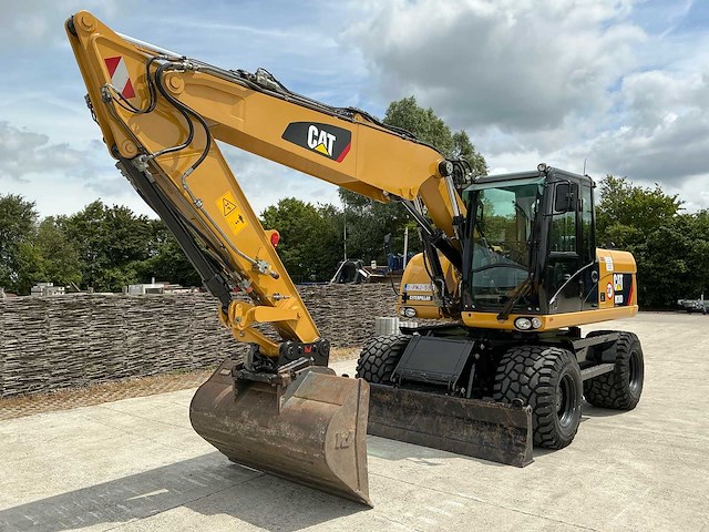 2011 caterpillar m316d banden graafmachine - afbeelding 37 van  65