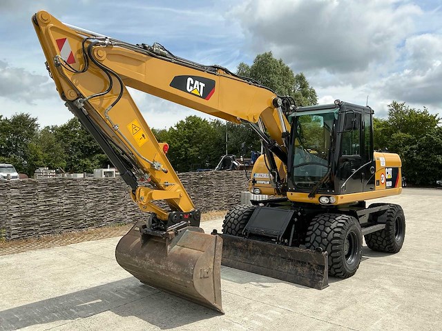 2011 caterpillar m316d banden graafmachine - afbeelding 38 van  65