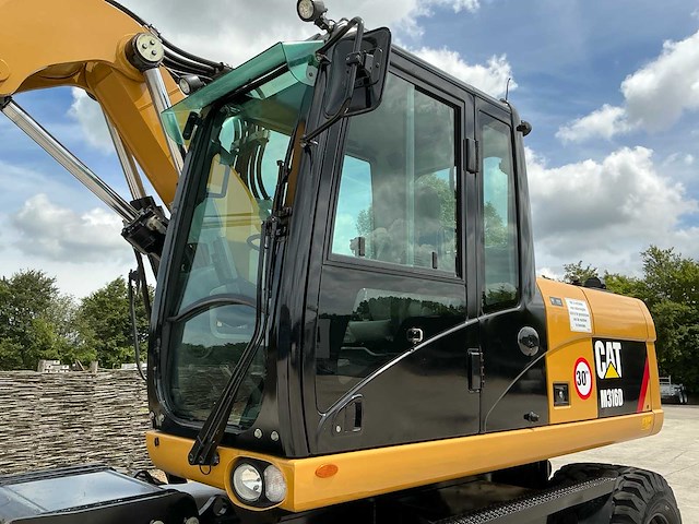 2011 caterpillar m316d banden graafmachine - afbeelding 55 van  65