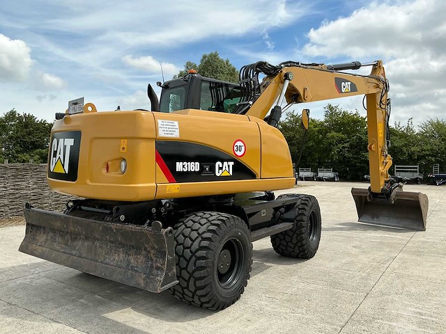 2011 caterpillar m316d banden graafmachine - afbeelding 63 van  65