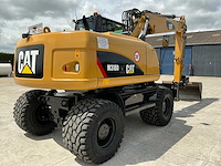 2011 caterpillar m316d banden graafmachine - afbeelding 64 van  65