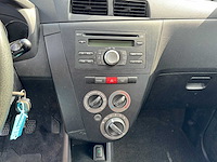 2011 daihatsu cuore 1.0 clever s airco personenauto - afbeelding 10 van  13