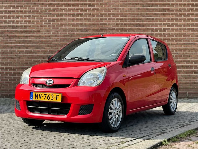 2011 daihatsu cuore 1.0 clever s airco personenauto - afbeelding 1 van  13