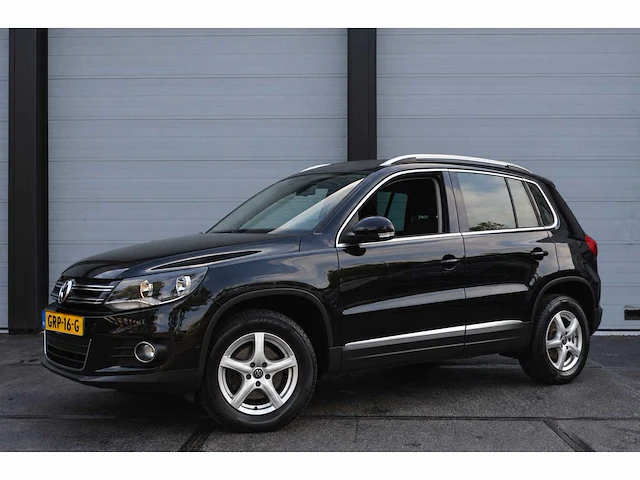 2011 volkswagen tiguan 2.0 tsi sport&st.4m personenauto - afbeelding 1 van  11