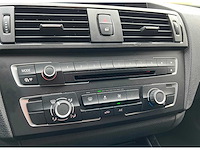 2013 bmw 1-serie 114i ede business sport | cruisecontrol + airco + scherm | personenauto - afbeelding 19 van  23