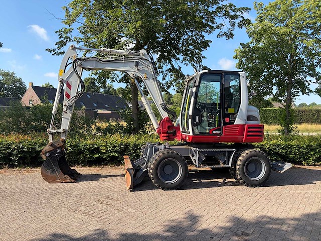 2014 - takeuchi - tb295w - banden graafmachine - afbeelding 1 van  29
