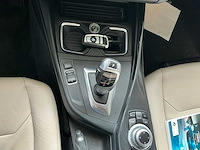 2014 bmw 1-serie 116i executive personenauto - afbeelding 19 van  31