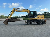 2014 new holland we150b pro banden graafmachine - afbeelding 12 van  51