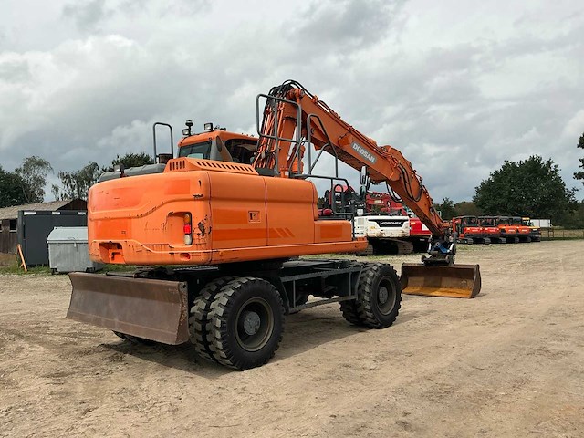 2015 - doosan - dx140-3 - wheeled excavator - afbeelding 31 van  35