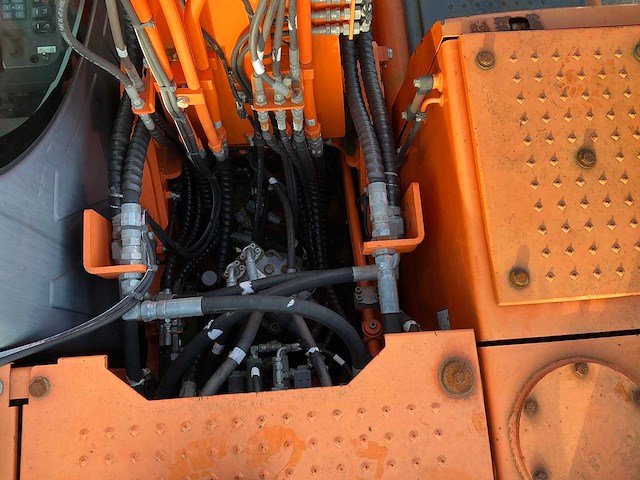 2015 doosan dx140w-3 banden graafmachine - afbeelding 18 van  21