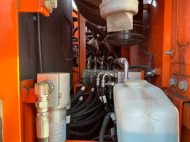 2015 doosan dx140w-3 banden graafmachine - afbeelding 20 van  21