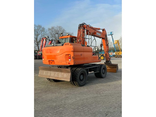 2015 doosan dx140w-3 banden graafmachine - afbeelding 4 van  21