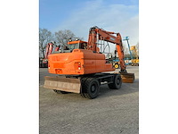 2015 doosan dx140w-3 banden graafmachine - afbeelding 4 van  21