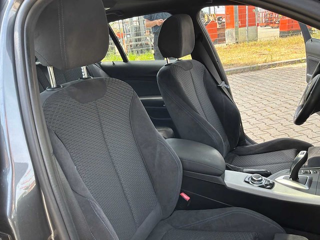 2016 bmw 1-serie 118i cent exe personenauto - afbeelding 26 van  42