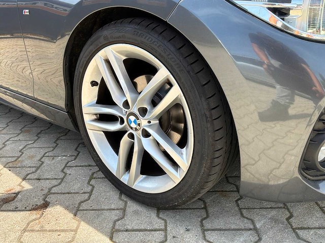 2016 bmw 1-serie 118i cent exe personenauto - afbeelding 31 van  42