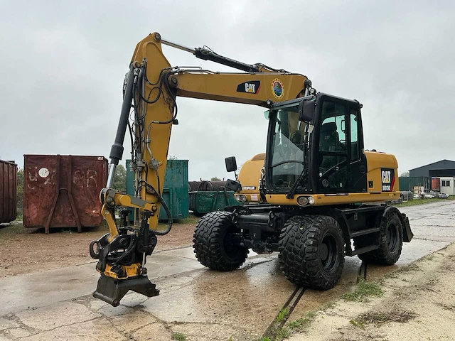 2016 caterpillar m313d banden graafmachine - afbeelding 1 van  36