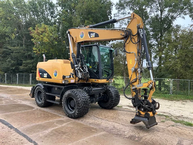 2016 caterpillar m313d banden graafmachine - afbeelding 12 van  36