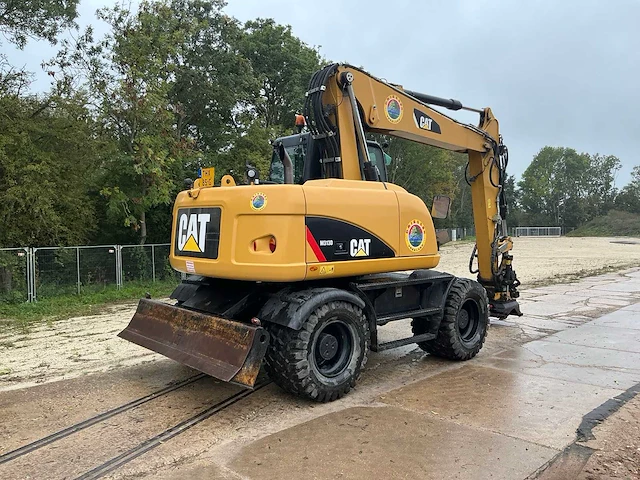 2016 caterpillar m313d banden graafmachine - afbeelding 23 van  36