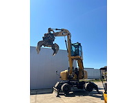 2016 caterpillar mh3022 banden graafmachine - afbeelding 14 van  28