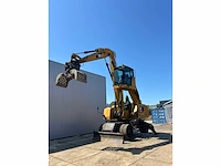 2016 caterpillar mh3022 banden graafmachine - afbeelding 11 van  28
