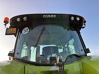 2016 claas arion 650 vierwielaangedreven landbouwtractor met voorlader - afbeelding 32 van  40