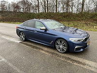2017 bmw 5-serie m550i xd executive personenauto - afbeelding 32 van  34