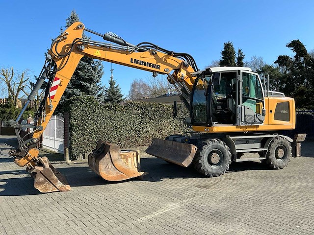 2017 liebherr 914 banden graafmachine - afbeelding 1 van  38