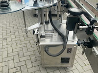 2019 hg machinery hg-1.0 volautomatische flessen vulmachine met etiketteer machine - afbeelding 48 van  52