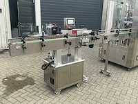 2019 hg machinery hg-1.0 volautomatische flessen vulmachine met etiketteer machine - afbeelding 39 van  52