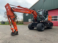 2019 hitachi zx140w-6 banden graafmachine - afbeelding 1 van  49