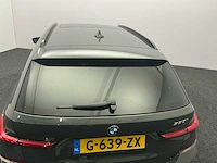 2020 bmw 3-serie touring 330i high. ex. ed. personenauto - afbeelding 14 van  48