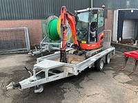 2022 kubota kx019 minigraafmachine met machinetransporter - afbeelding 1 van  16
