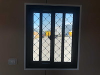 2025 rhino-cross-containers 1 deur en 3 ramen zwart 40ft hq/12 m - containerwoning / container office unit - afbeelding 28 van  35