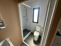 2025 rhino-cross-containers 1 deur en 3 ramen zwart 40ft hq/12 m - containerwoning / container office unit - afbeelding 30 van  35