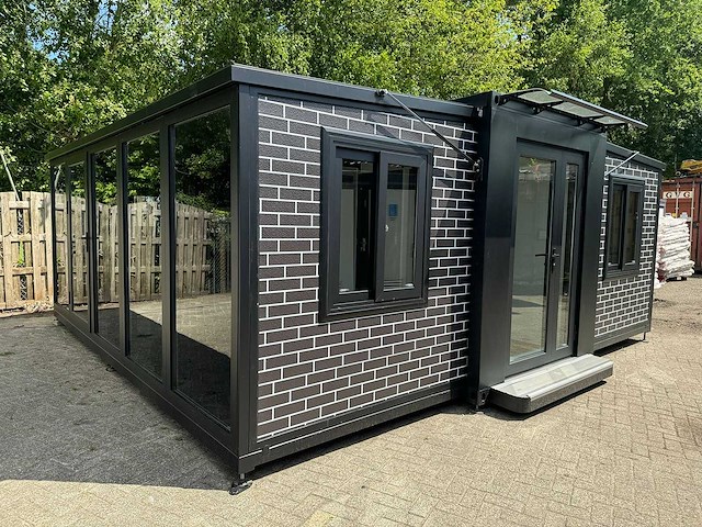 2025 rhino houses 36,5 m2 met glazen wand, 2 slaapkamers, badkamer en keuken mobiele woonunit / tiny house - afbeelding 1 van  22
