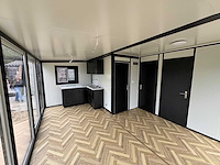2025 rhino houses 36,5 m2 met glazen wand, 2 slaapkamers, badkamer en keuken mobiele woonunit / tiny house - afbeelding 13 van  22