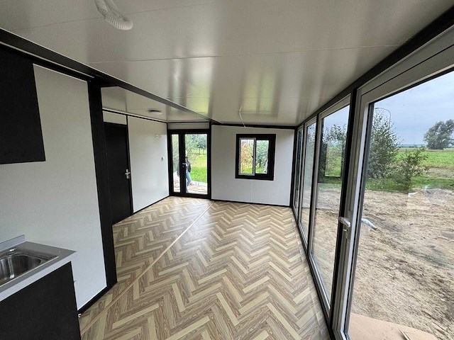 2025 rhino houses 36,5 m2 met glazen wand, 2 slaapkamers, badkamer en keuken mobiele woonunit / tiny house - afbeelding 19 van  19