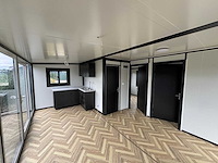 2025 rhino houses 36,5 m2 met glazen wand, 2 slaapkamers, badkamer en keuken mobiele woonunit / tiny house - afbeelding 18 van  22