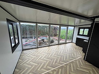 2025 rhino houses 36,5 m2 met glazen wand, 2 slaapkamers, badkamer en keuken mobiele woonunit / tiny house - afbeelding 19 van  22