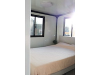 2026 rhino-houses 36,5 m2 2 slaapkamers, badkamer en keuken mobiele woonunit / tiny house met luifel / balkon - afbeelding 45 van  70