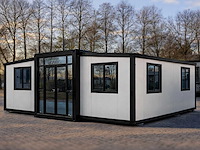 2026 rhino houses 36,5 m2 wit 2 slaapkamers, badkamer en keuken mobiele woonunit / tiny house met luifel / balkon - afbeelding 1 van  6