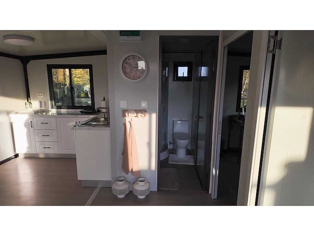 2026 rhino houses 36,5 m2 wit 2 slaapkamers, badkamer en keuken mobiele woonunit / tiny house met luifel / balkon - afbeelding 9 van  74