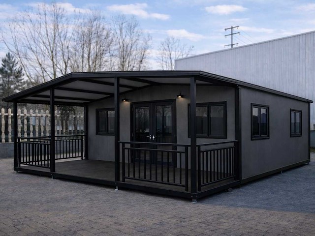 2026 rhino houses 36,5 m2 zwart 2 slaapkamers, badkamer en keuken mobiele woonunit / tiny house met luifel / balkon - afbeelding 1 van  18
