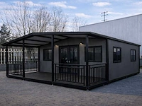 2026 rhino houses 36,5 m2 zwart 2 slaapkamers, badkamer en keuken mobiele woonunit / tiny house met luifel / balkon