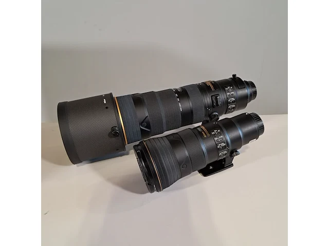 2x camera lens, nikon, o.a af-s nikkor 180-400mm 1:4e tc1.4 fl ed - afbeelding 12 van  23