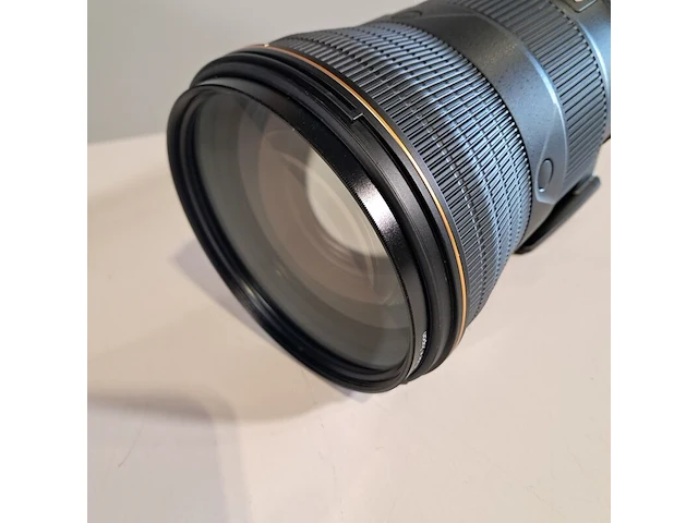 2x camera lens, nikon, o.a af-s nikkor 180-400mm 1:4e tc1.4 fl ed - afbeelding 18 van  23