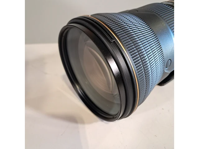 2x camera lens, nikon, o.a af-s nikkor 180-400mm 1:4e tc1.4 fl ed - afbeelding 18 van  23